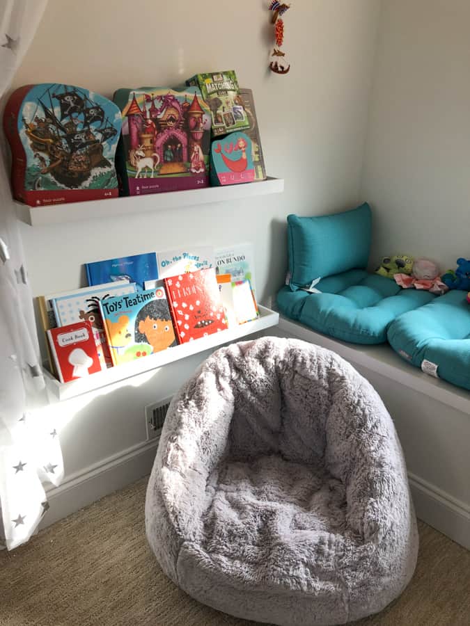 toddler reading nook with floating shelves