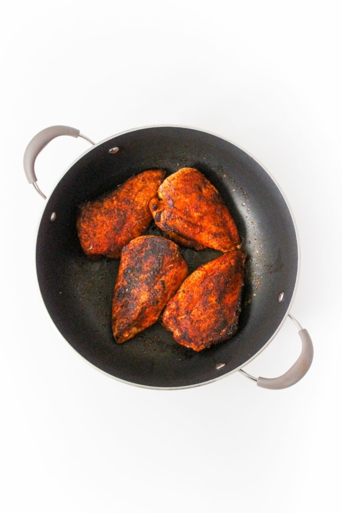 seared chicken breasts in a skillet