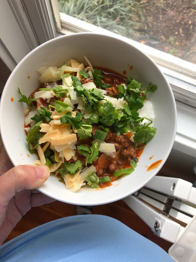 beef and black bean chili with toppings