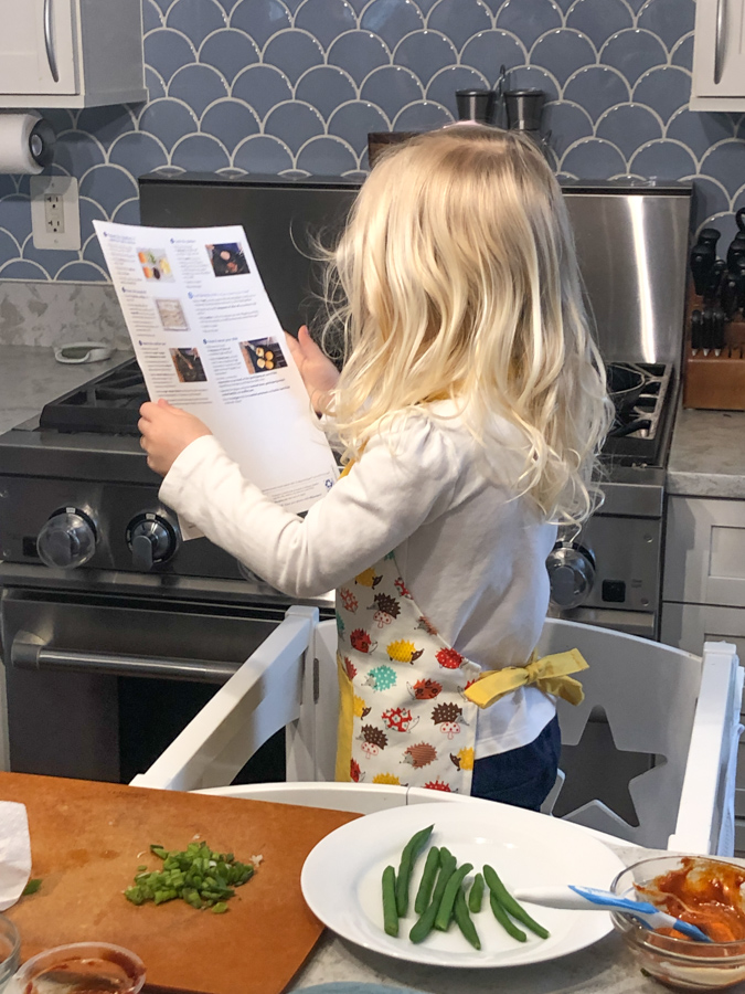 toddler helping making dinner with blue apron