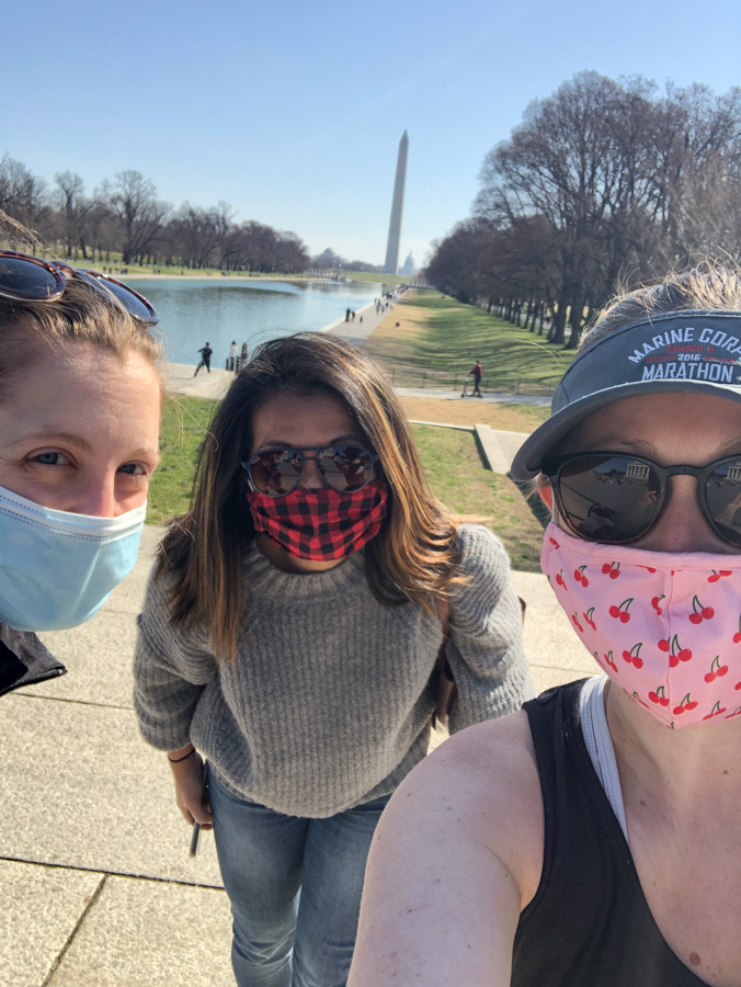 masked up walk by the monuments