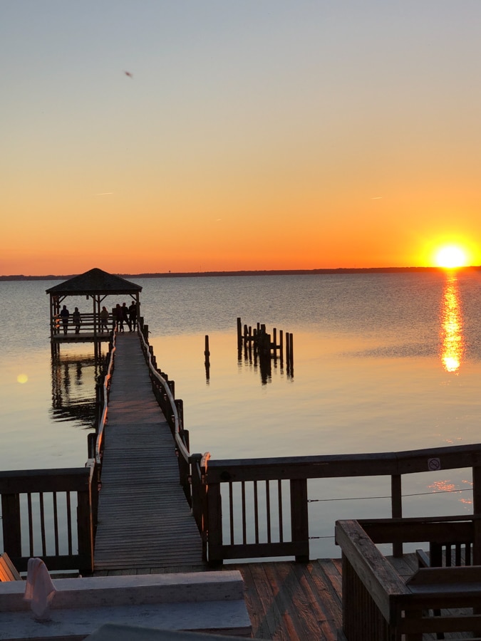 sunset view over the boardwalk in duck nc