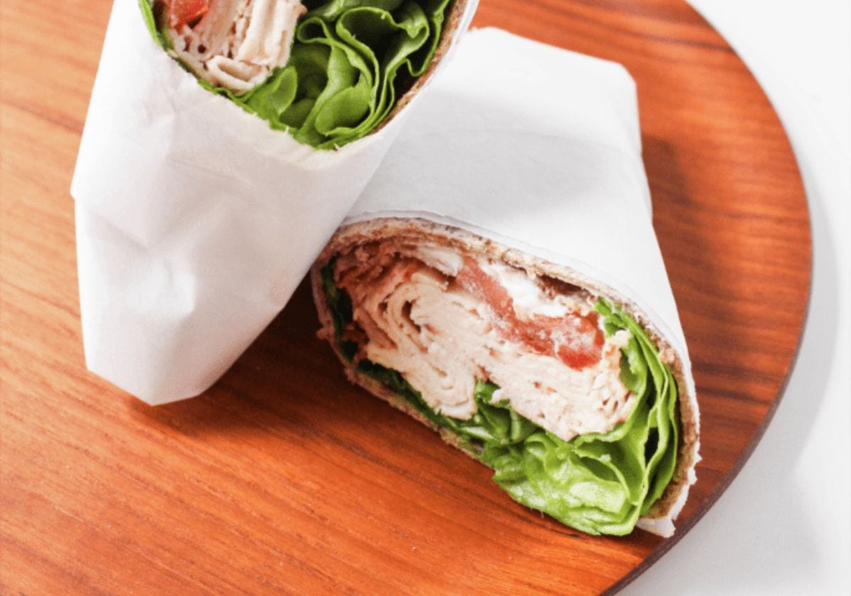 turkey bacon wrap on a wooden platter