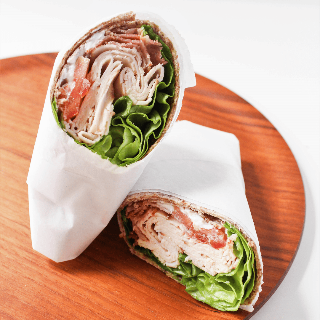 turkey bacon wrap on a wooden platter