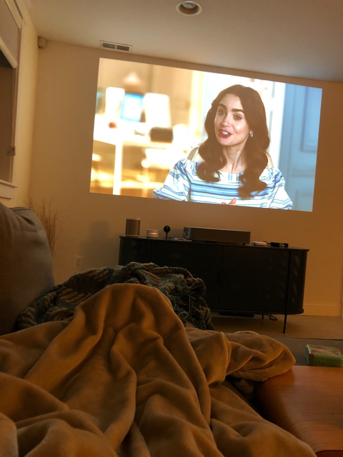 watching emily in paris on the couch