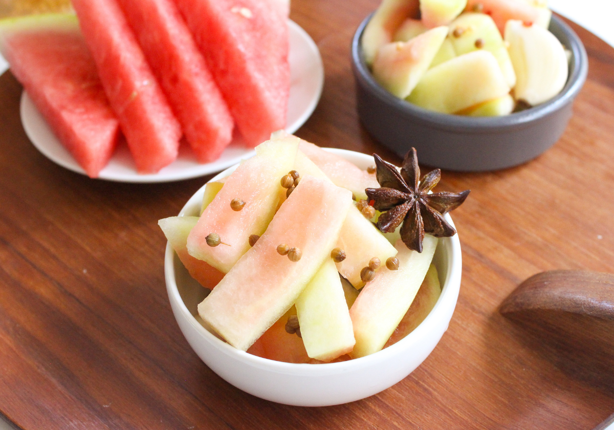 fermented watermelon rind pickles in a small bowl