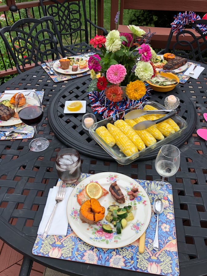 dinner table with salmon and vegetables
