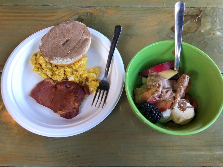 sourdough bagels, eggs, bacon, and fruit