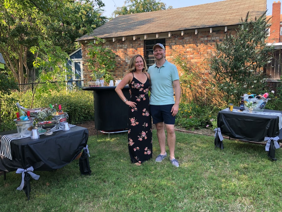anne and matt mauney in a backyard