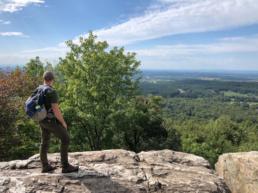 standing and looking at the bear's den overlook view