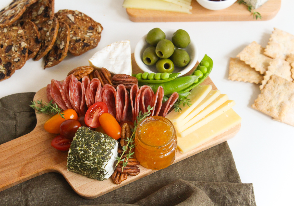 small charcuterie board with cheese and jam
