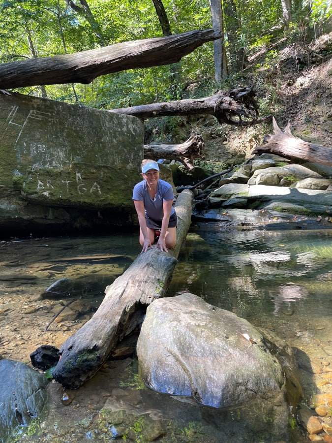 climbing on a log in potomac overlook park