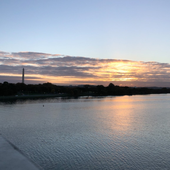 sunrise view from memorial bridge into dc