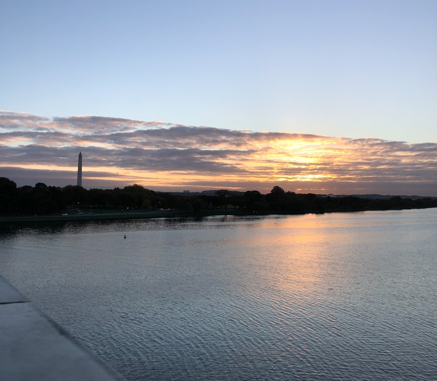 sunrise view from memorial bridge into dc