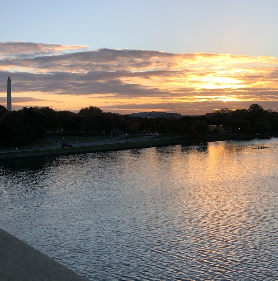 sunrise view from memorial bridge into dc