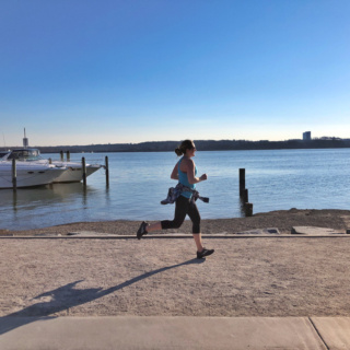 anne mauney running along old town waterfront.