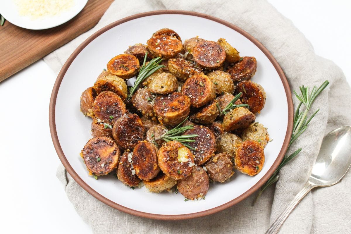 roasted garlic parmesan potatoes in a bowl