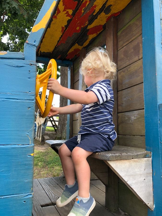 toddler pretending to drive