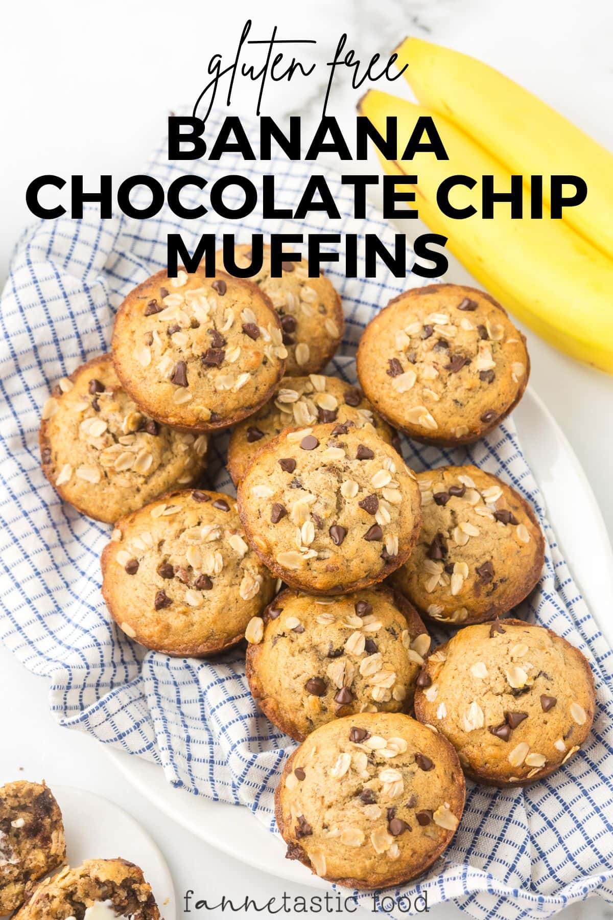 basket of chocolate chip banana muffins with a checkered blue and white kitchen towel